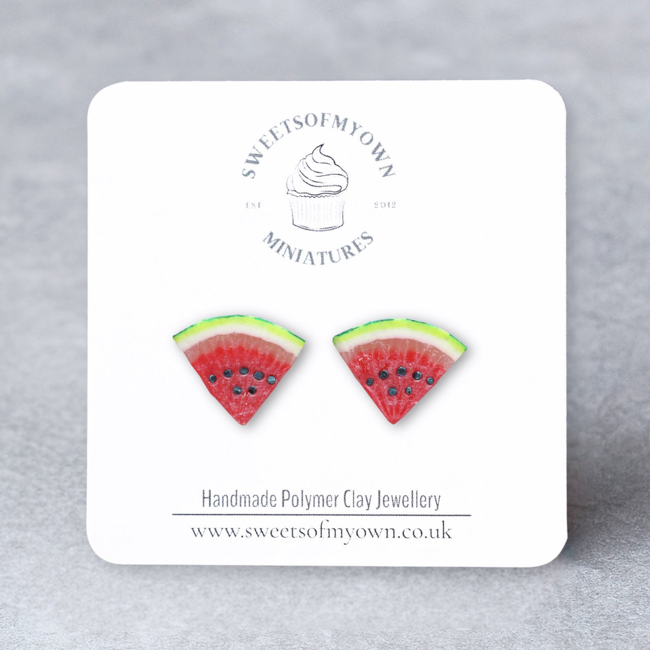 Watermelon slice earrings on a branded card with 'SweetsofMyOwn' logo.