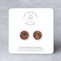 Thumbnail for Chocolate Doughnuts with Rainbow Spinkles as Stud Earrings on a sweetsofmyown branded backing card.